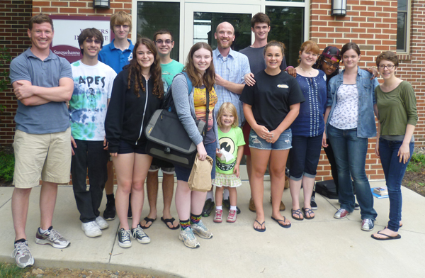 Left to right: Bobby Mitchell, Christopher Lombardo, Nate Adler, Amelia Channin, Travis Bederka, Allison, Silas Dent-Zobal (and his daughter, Lake), Tom Leggett, Grace Dunnigan, Hannah Davis, Faith Thompson, Catherine Baker, and Mallory Steffey. Taken outside the Writers' Institute.